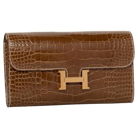 hermes constance crocodile clutch|Hermes constance price guide.